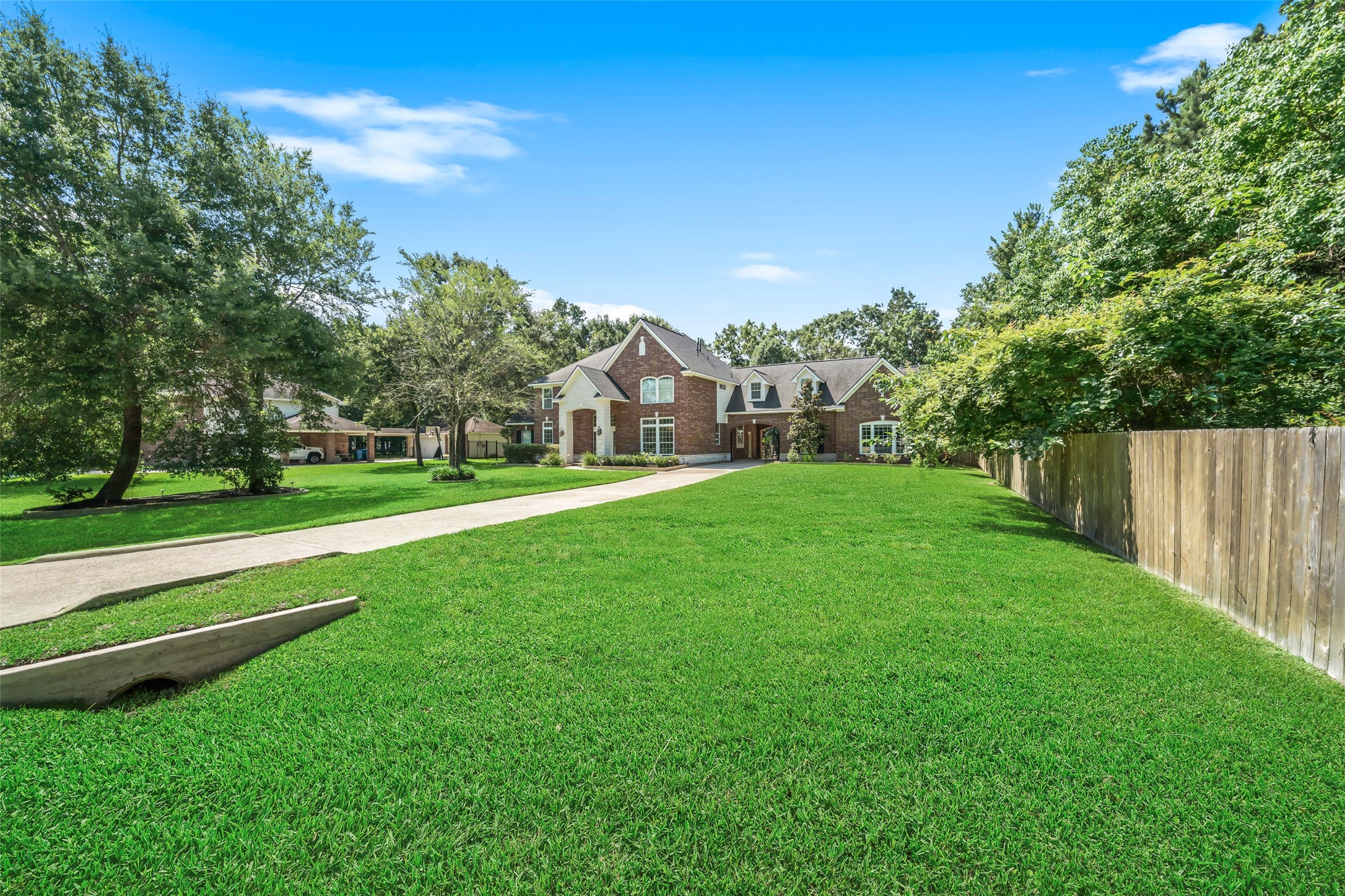 2302 Legends Shore Drive Spring, TX 77386 - Photo 48 of 48 Spacious homesite offering privacy, open green space, and room to enjoy the outdoors.