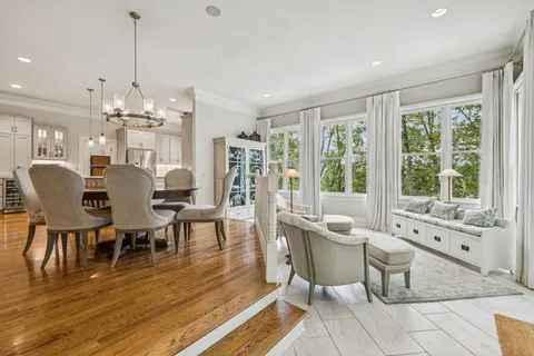 a bathroom with double vanity sinks and a mirror