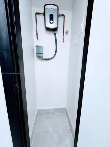 a view of a closet in a room