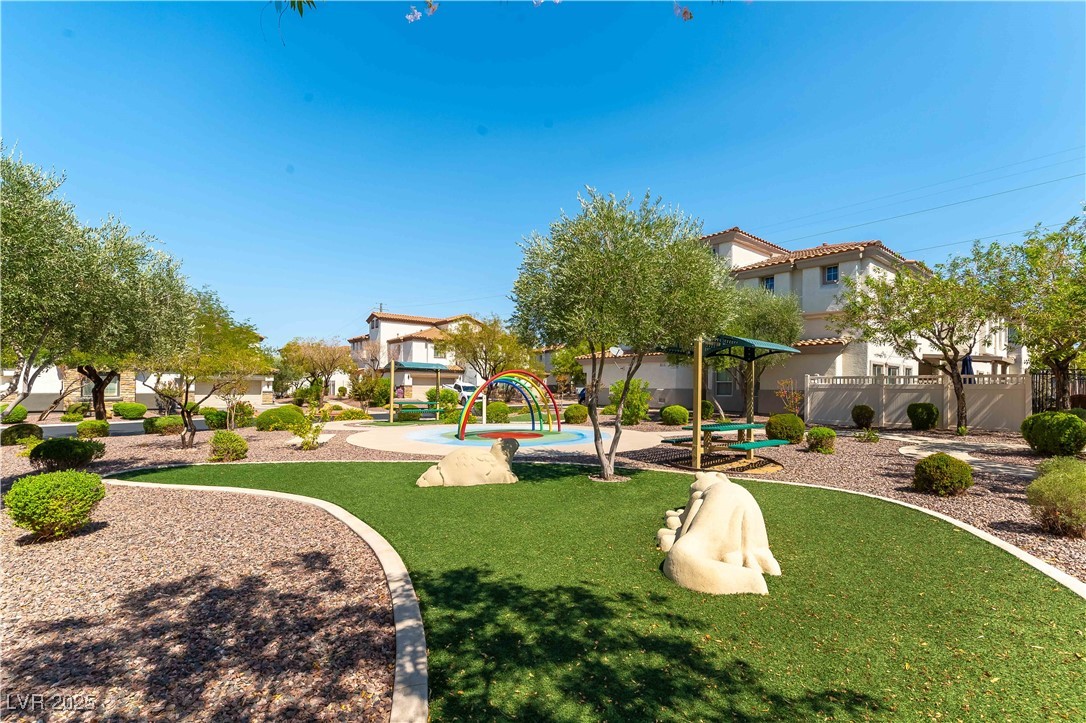 1109 Tropical Star Lane, Unit 1 Henderson, NV 89002 - Photo 5 of 41 Greens Space Pack and Toddler Play Area With Water Feature