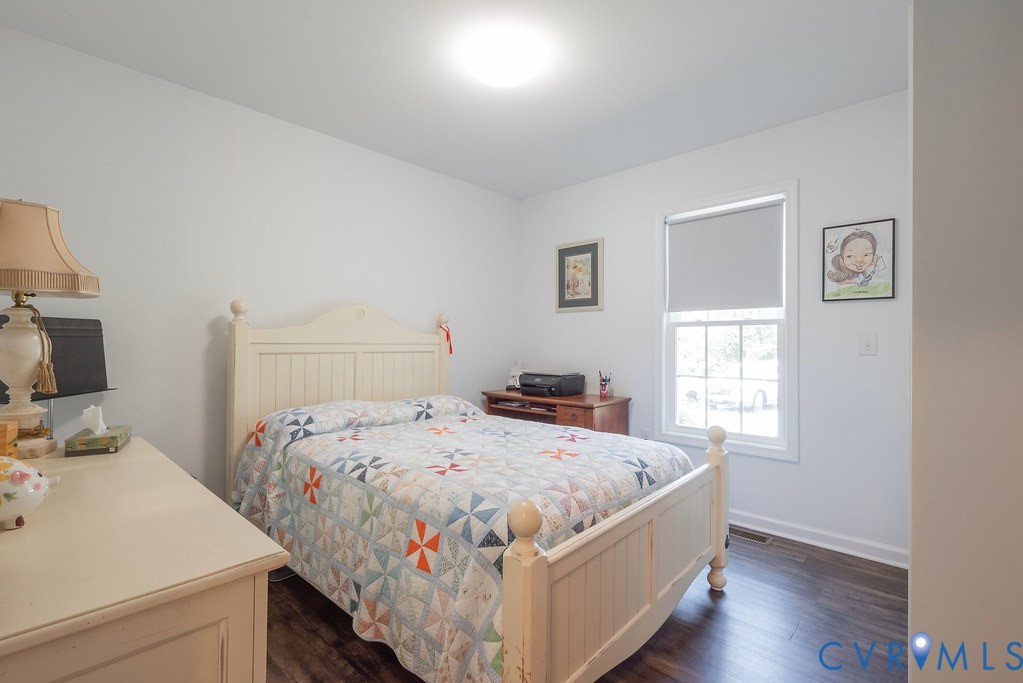 4336 Hells Bend Road Palmyra, VA 22963 - Photo 12 of 35 Bedroom featuring wood-finish flooring, white wall