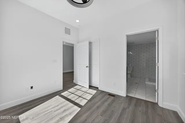 a view of livingroom with hardwood floor and a ceiling fan