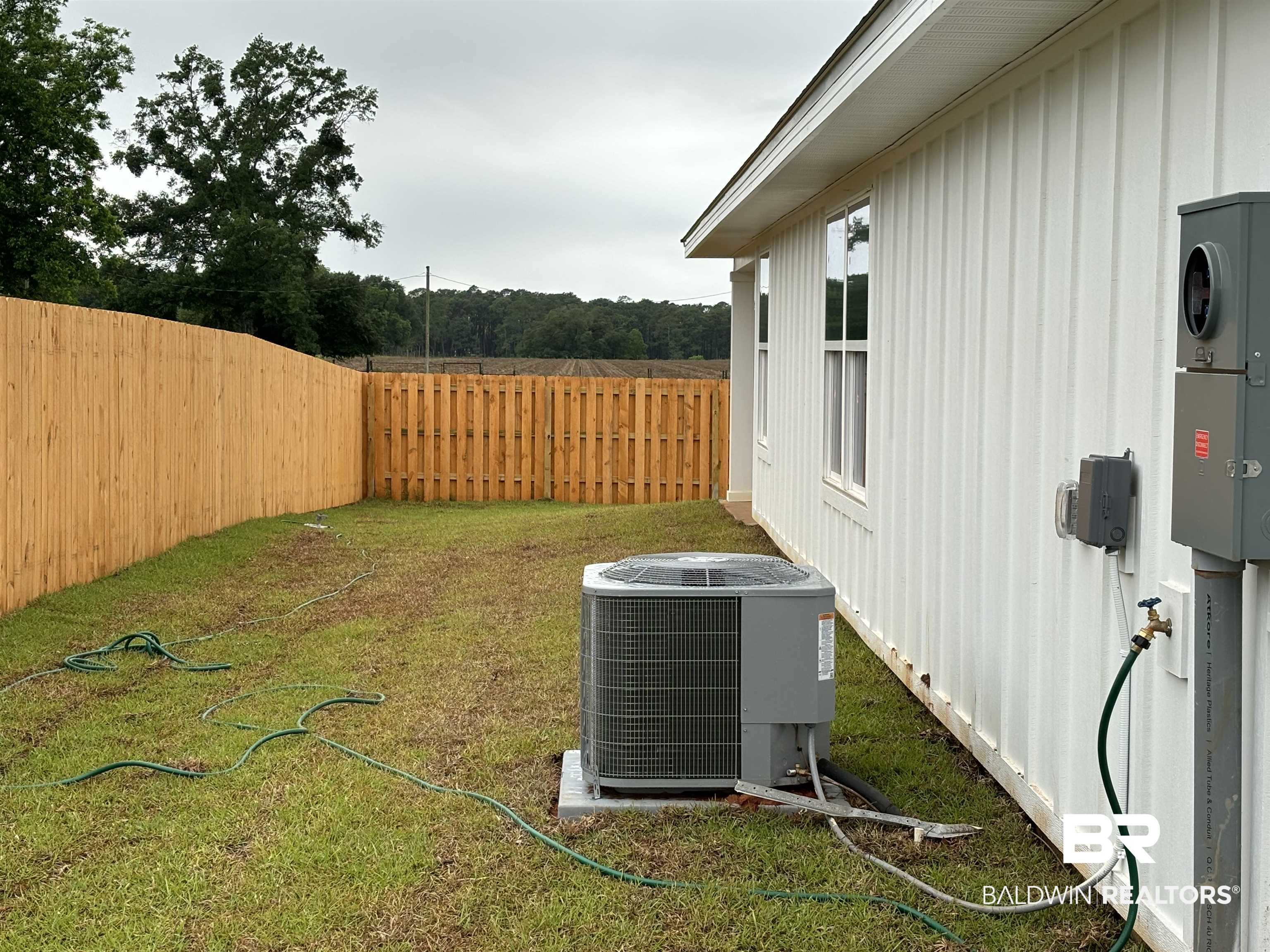 24532 Ponder Loop Loxley, AL 36551 - Photo 3 of 44 Left Side of House