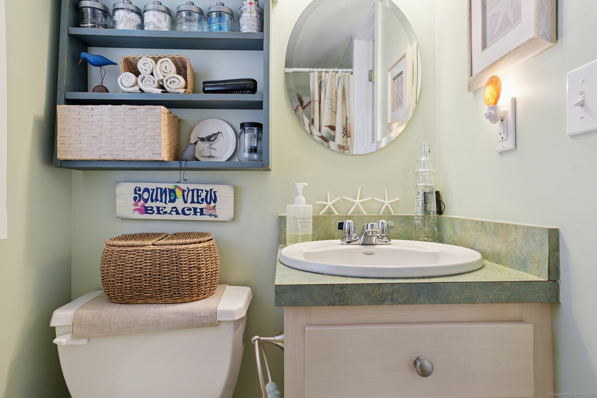 30 Hartford Avenue, Unit B Old Saybrook, CT 06475 - Photo 15 of 23 a bathroom with a toilet a sink and a mirror
