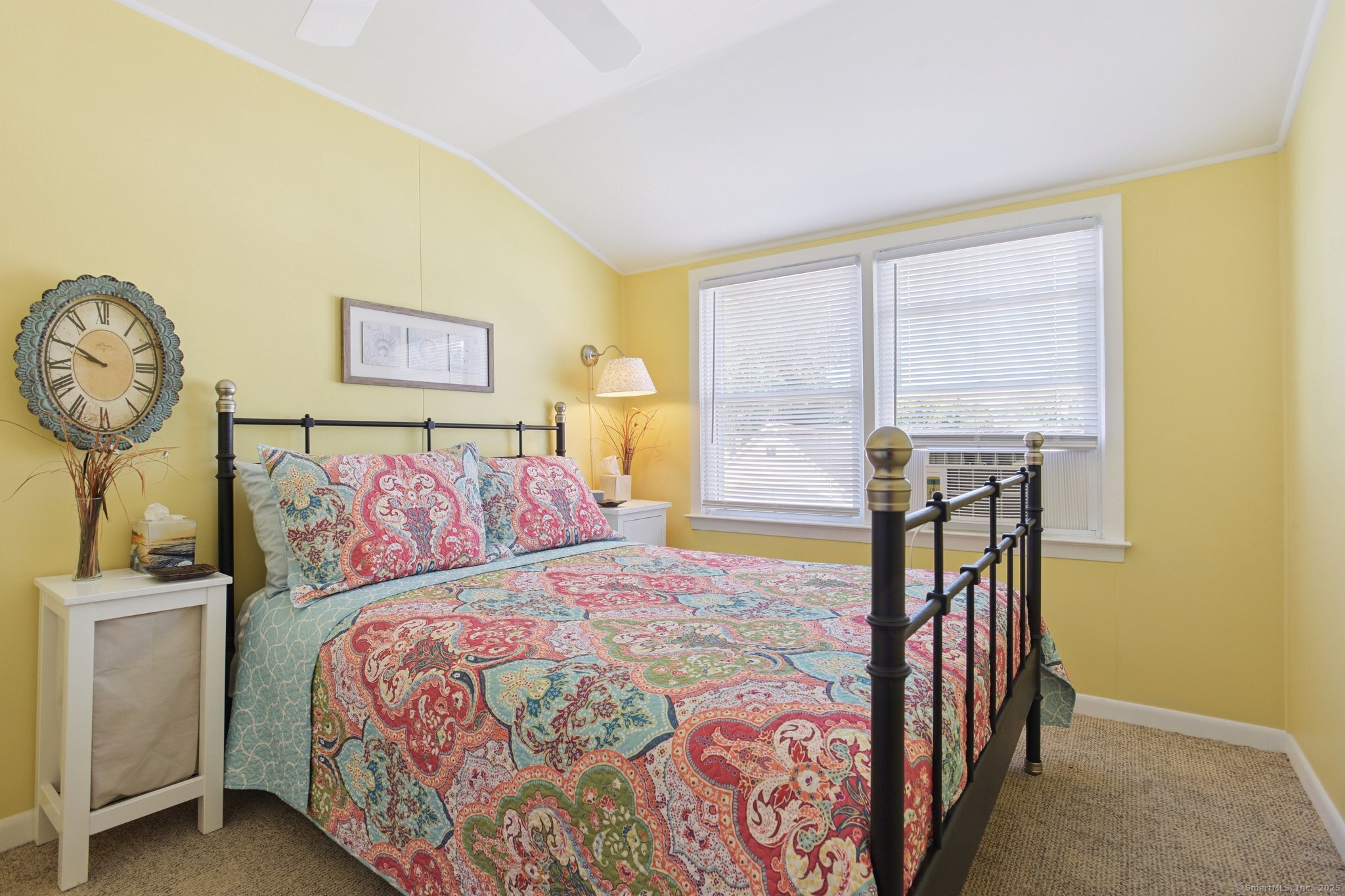 30 Hartford Avenue, Unit B Old Saybrook, CT 06475 - Photo 16 of 23 a bedroom with a bed and a window