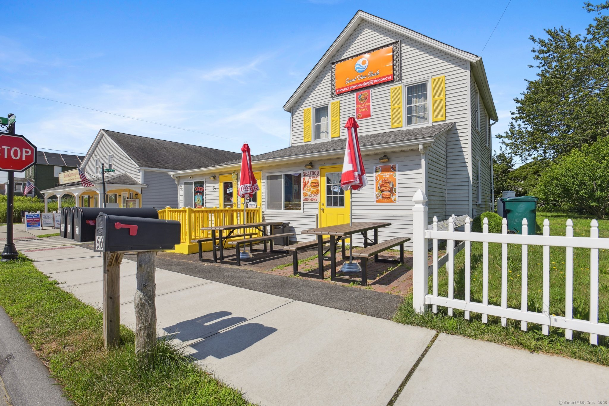 30 Hartford Avenue, Unit B Old Saybrook, CT 06475 - Photo 20 of 23 a front view of a house with porch