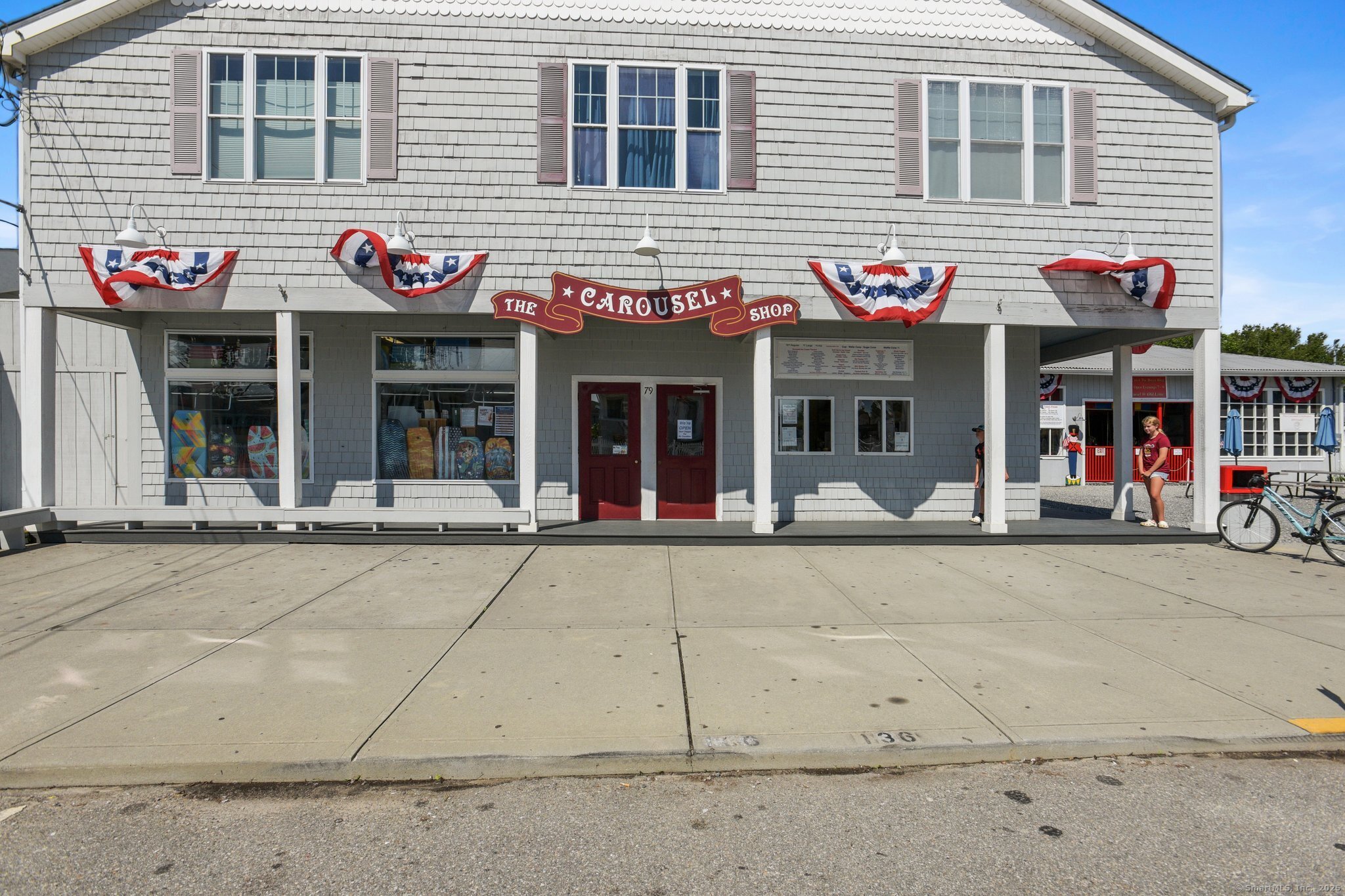 30 Hartford Avenue, Unit B Old Saybrook, CT 06475 - Photo 22 of 23 a front view of a building with retail shops