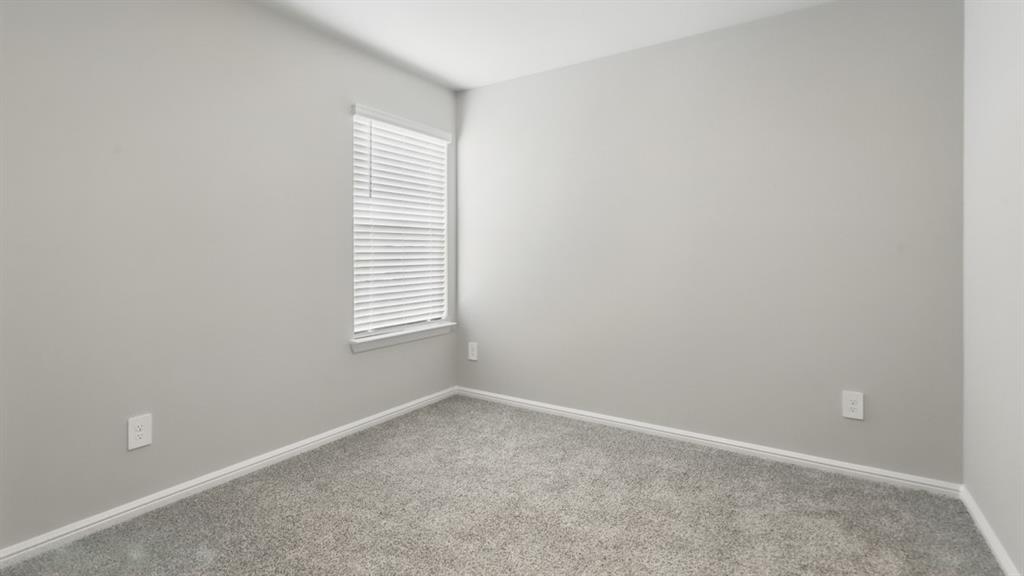 3149 Maple Orch Lane Fort Worth, TX 76140 - Photo 28 of 39 an empty room with windows