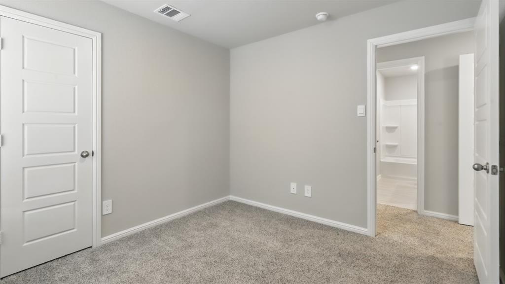 3149 Maple Orch Lane Fort Worth, TX 76140 - Photo 34 of 39 an empty room with closet area