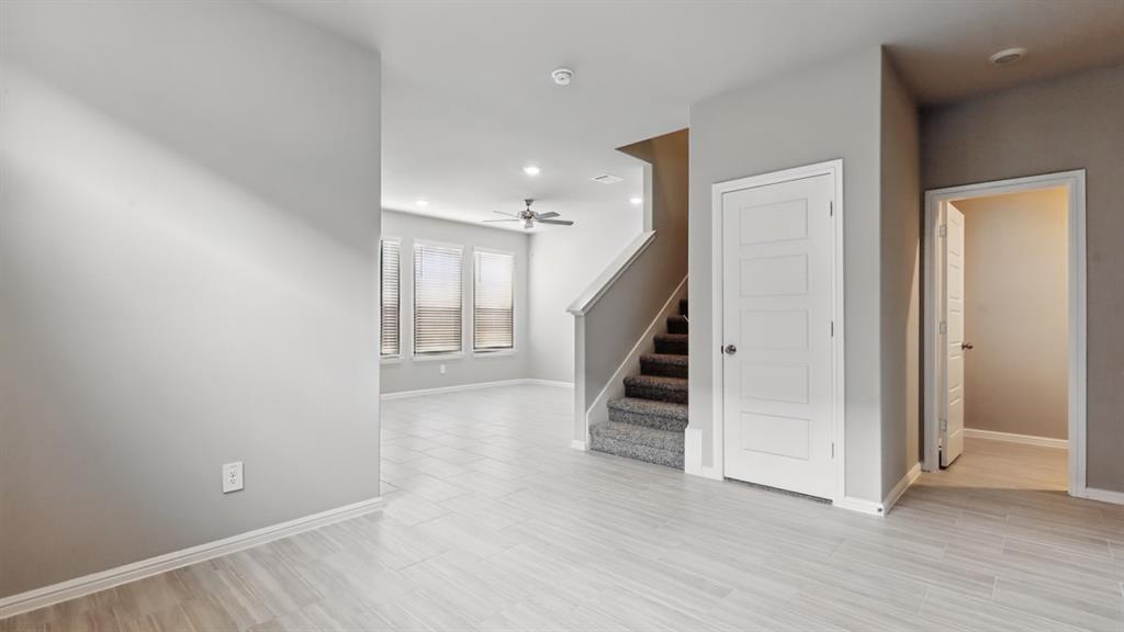 3149 Maple Orch Lane Fort Worth, TX 76140 - Photo 8 of 39 a view of an entryway with stairs