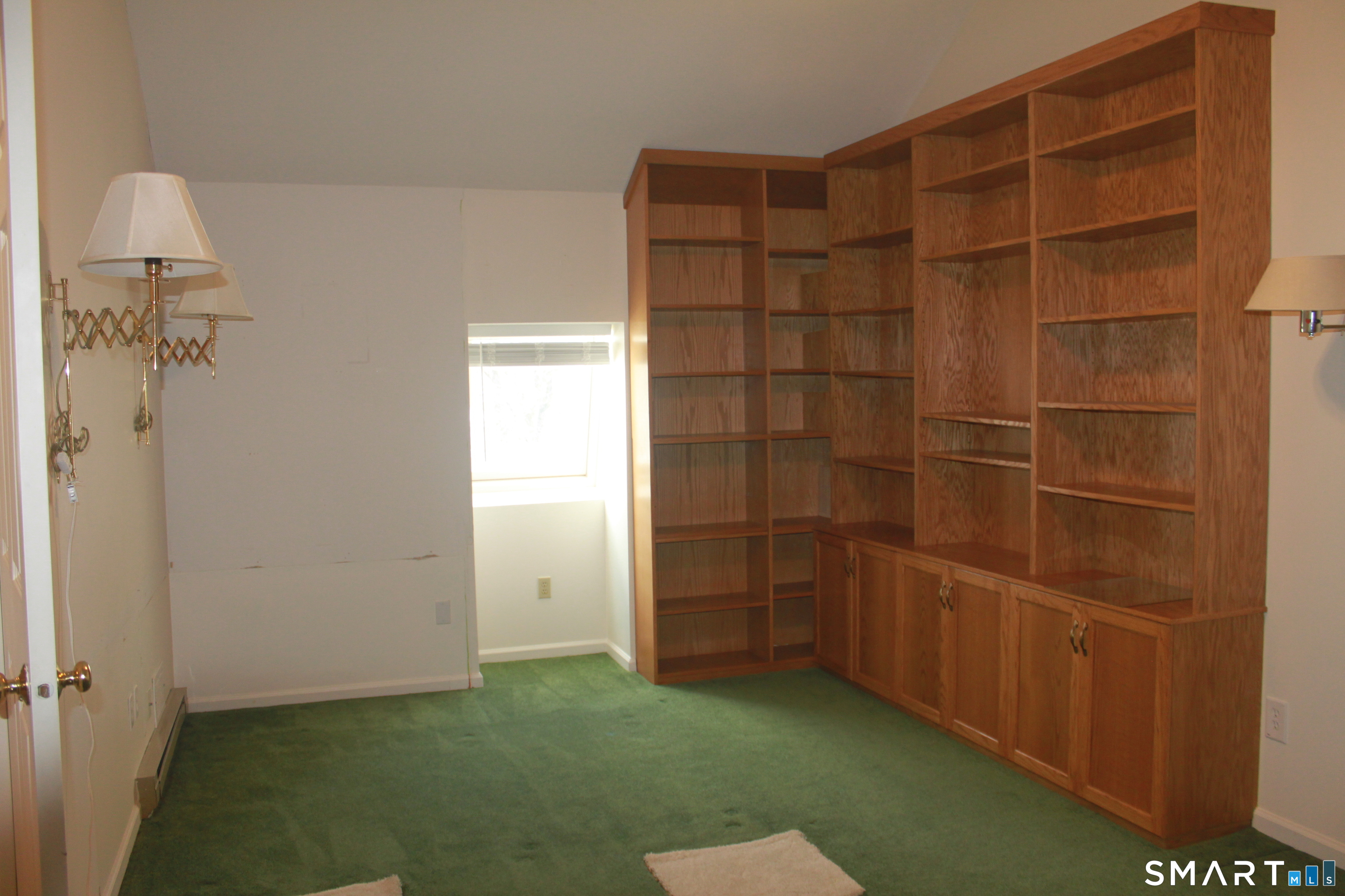 15 Downing Way, Unit 15 Suffield, CT 06078 - Photo 20 of 26 a view of walk in closet with empty racks