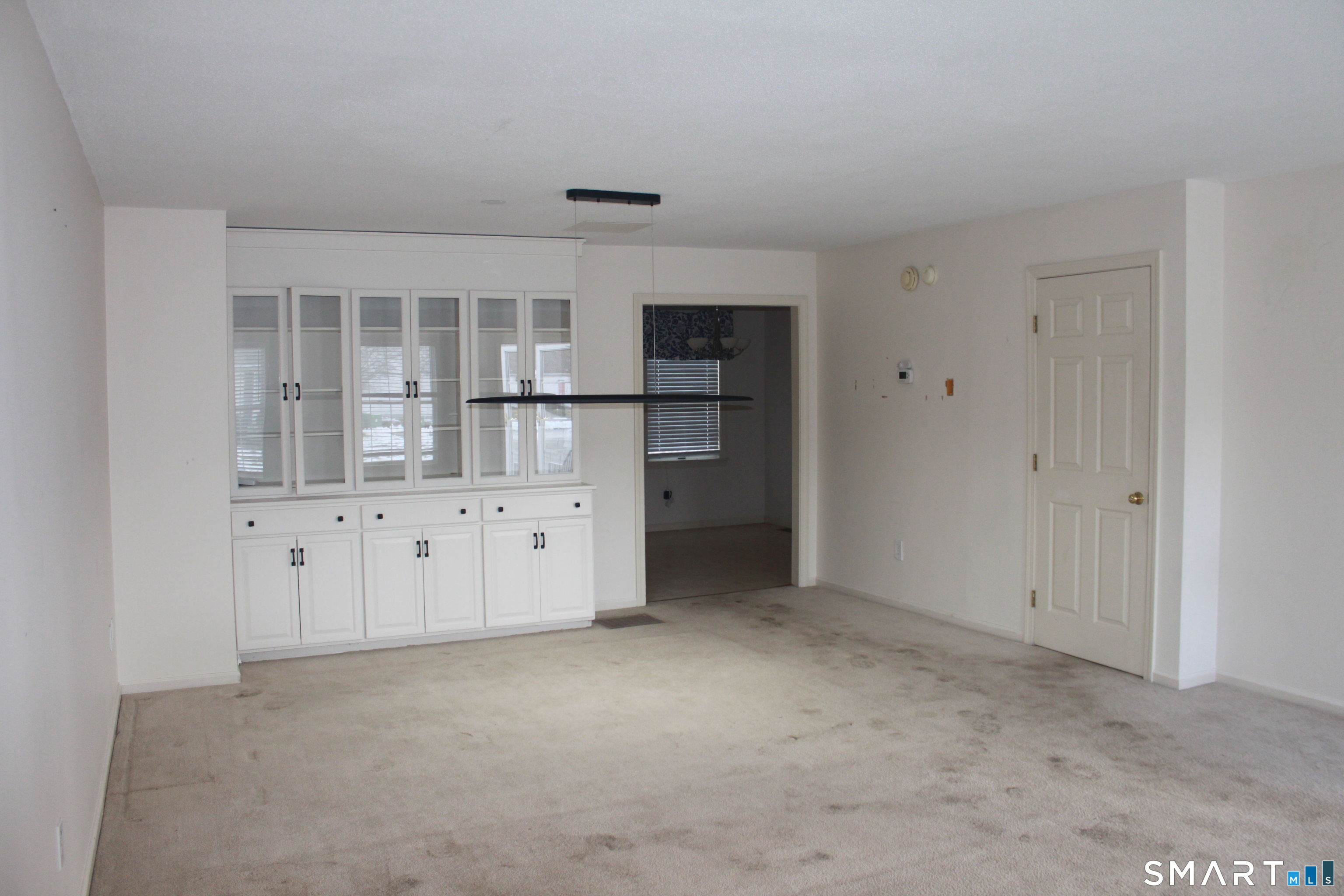 15 Downing Way, Unit 15 Suffield, CT 06078 - Photo 2 of 26 a view of kitchen with white cabinets