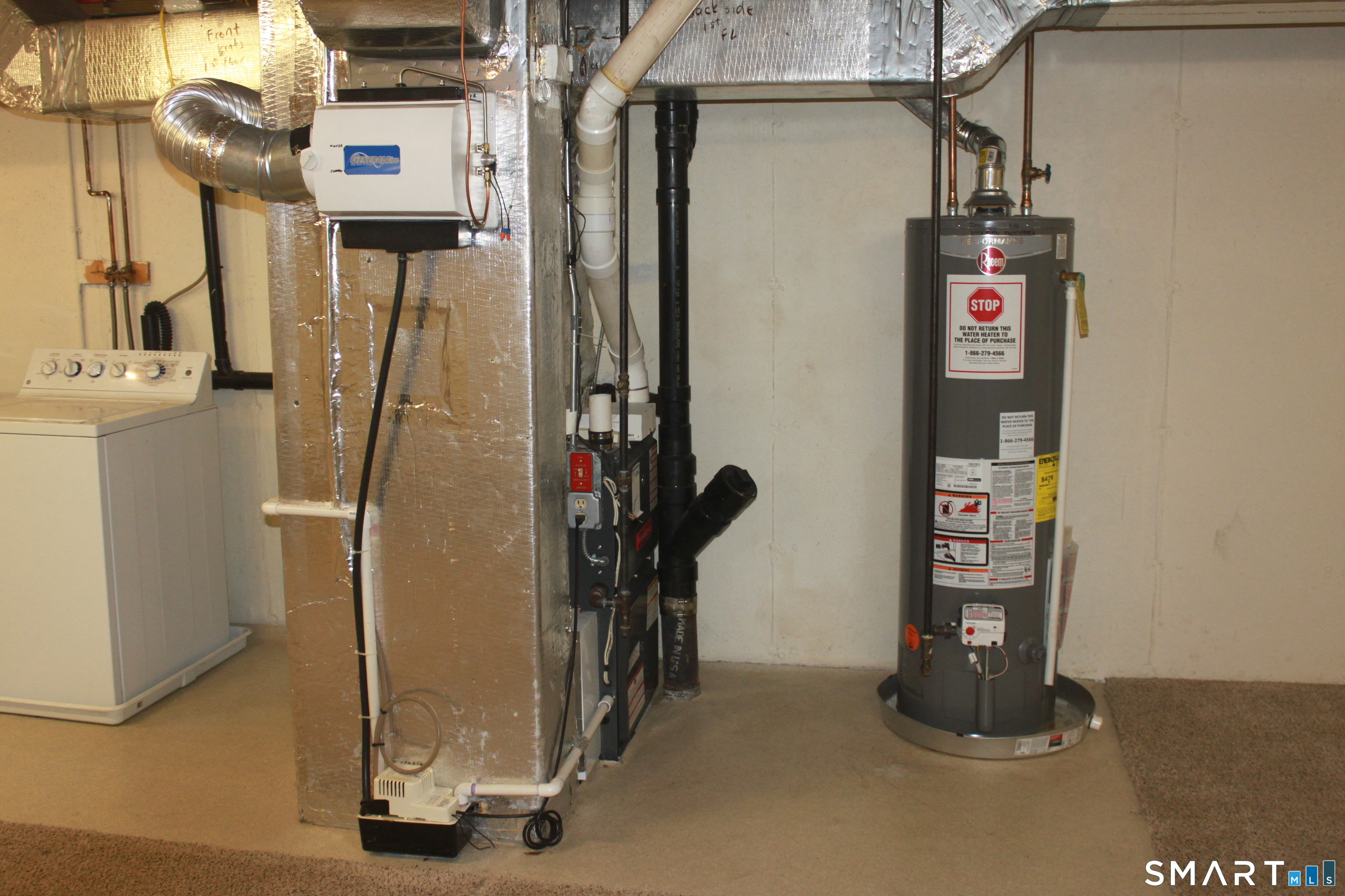 15 Downing Way, Unit 15 Suffield, CT 06078 - Photo 24 of 26 a view of storage and utility room