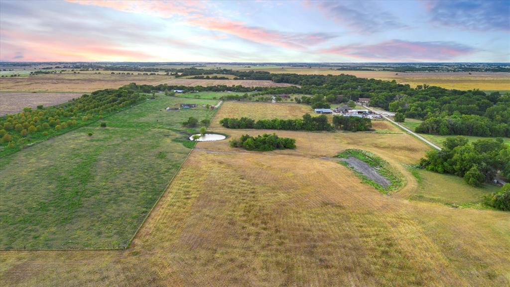 Tbd Holder Road Waxahachie, TX 75165 - Photo 18 of 24 Expansive acreage featuring multiple distinct fields, a natural pond, and mature tree lines