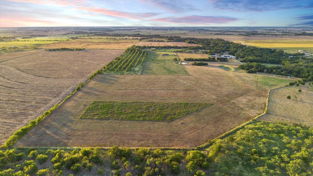 Tbd Holder Road Waxahachie, TX 75165 - Photo 9 of 24 Expansive acreage featuring multiple cultivated fields and natural tree lines