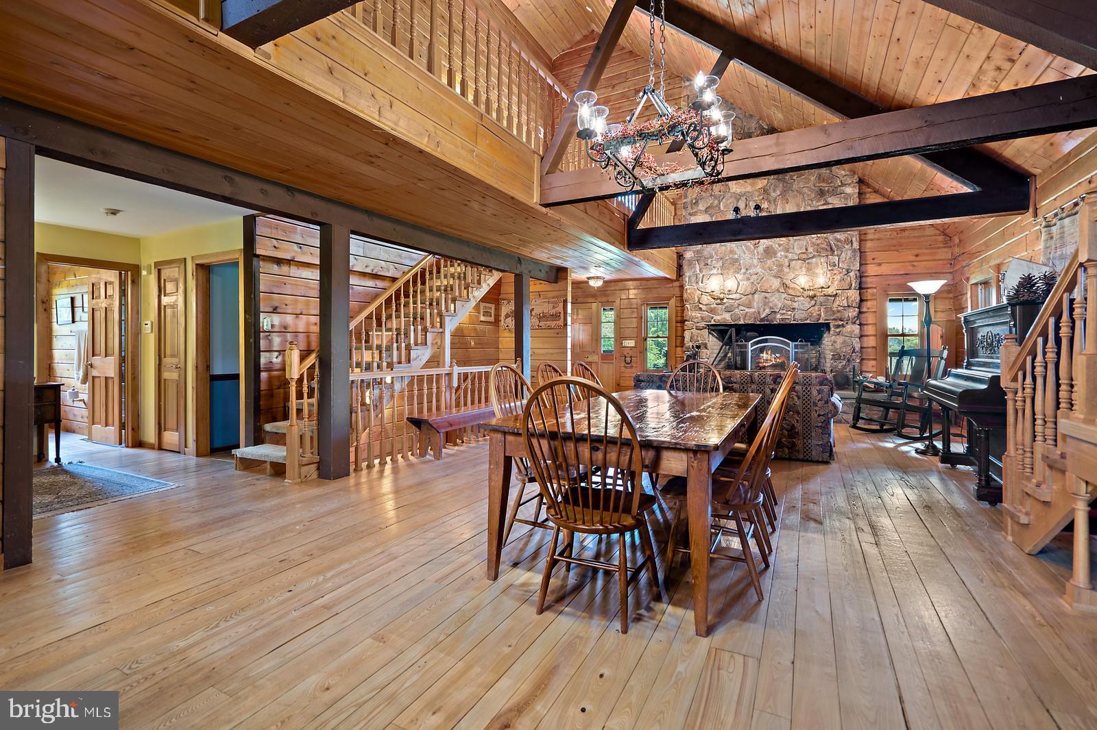 14249 Hume Road Hume, VA 22639 - Photo 11 of 48 a view of a dining room with furniture window and wooden floor
