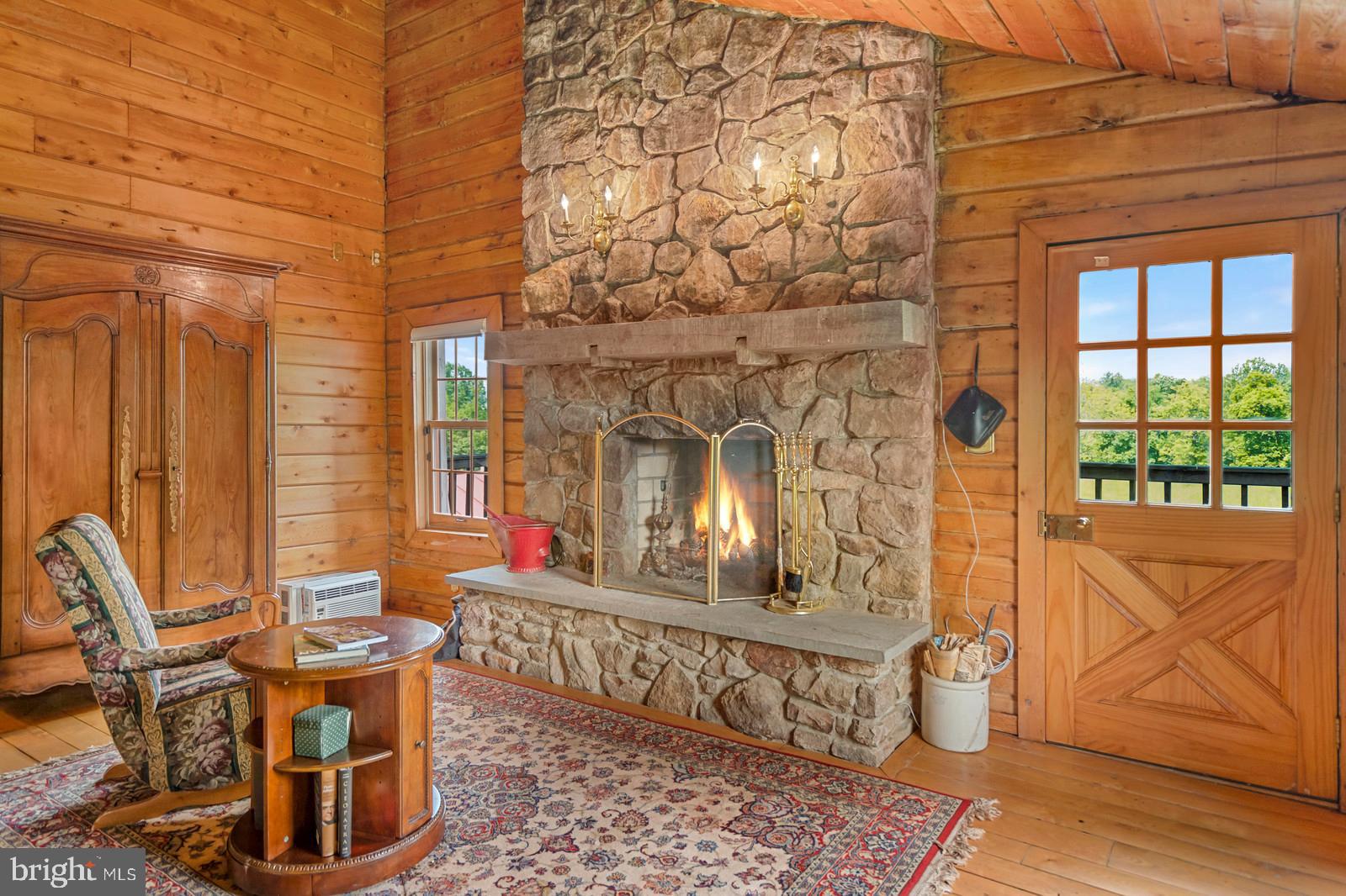 14249 Hume Road Hume, VA 22639 - Photo 19 of 48 a living room with furniture a window and wooden floor