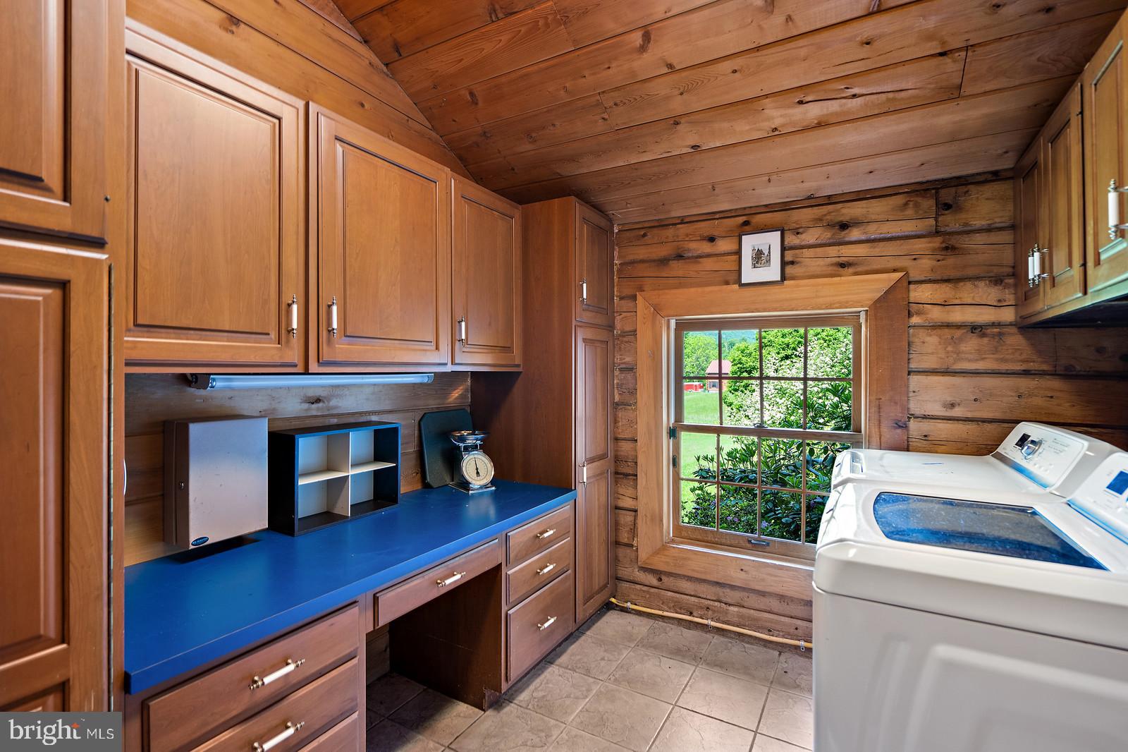 14249 Hume Road Hume, VA 22639 - Photo 26 of 48 a kitchen with a refrigerator and a sink