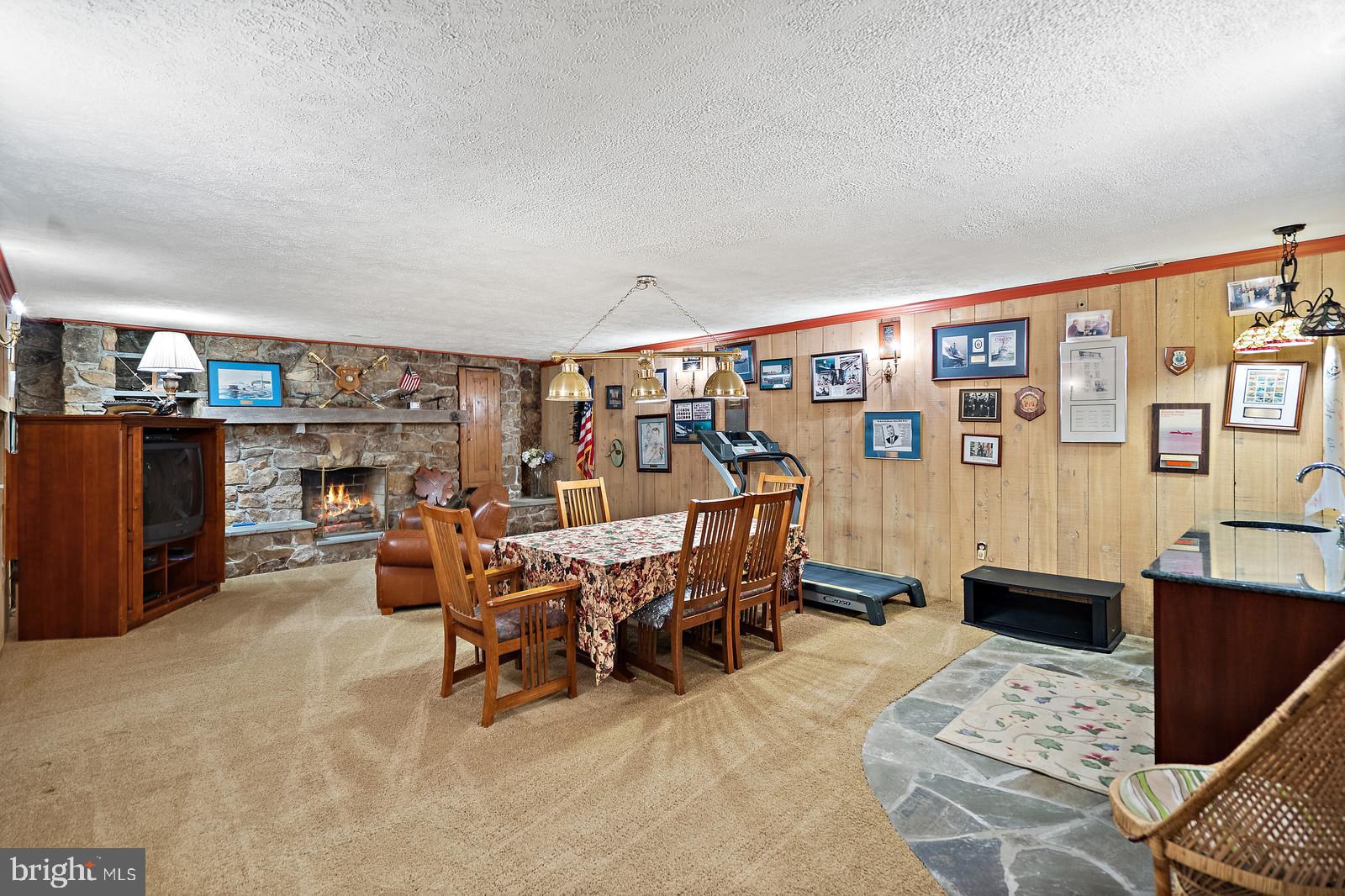 14249 Hume Road Hume, VA 22639 - Photo 27 of 48 a view of a livingroom with furniture and a couch