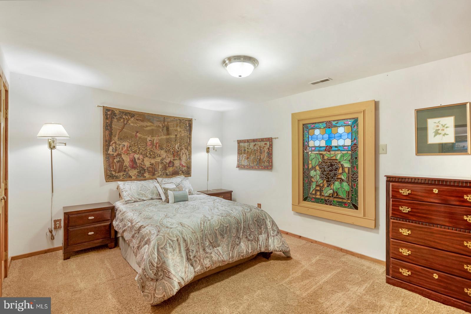 14249 Hume Road Hume, VA 22639 - Photo 29 of 48 a bedroom with a bed next to a window