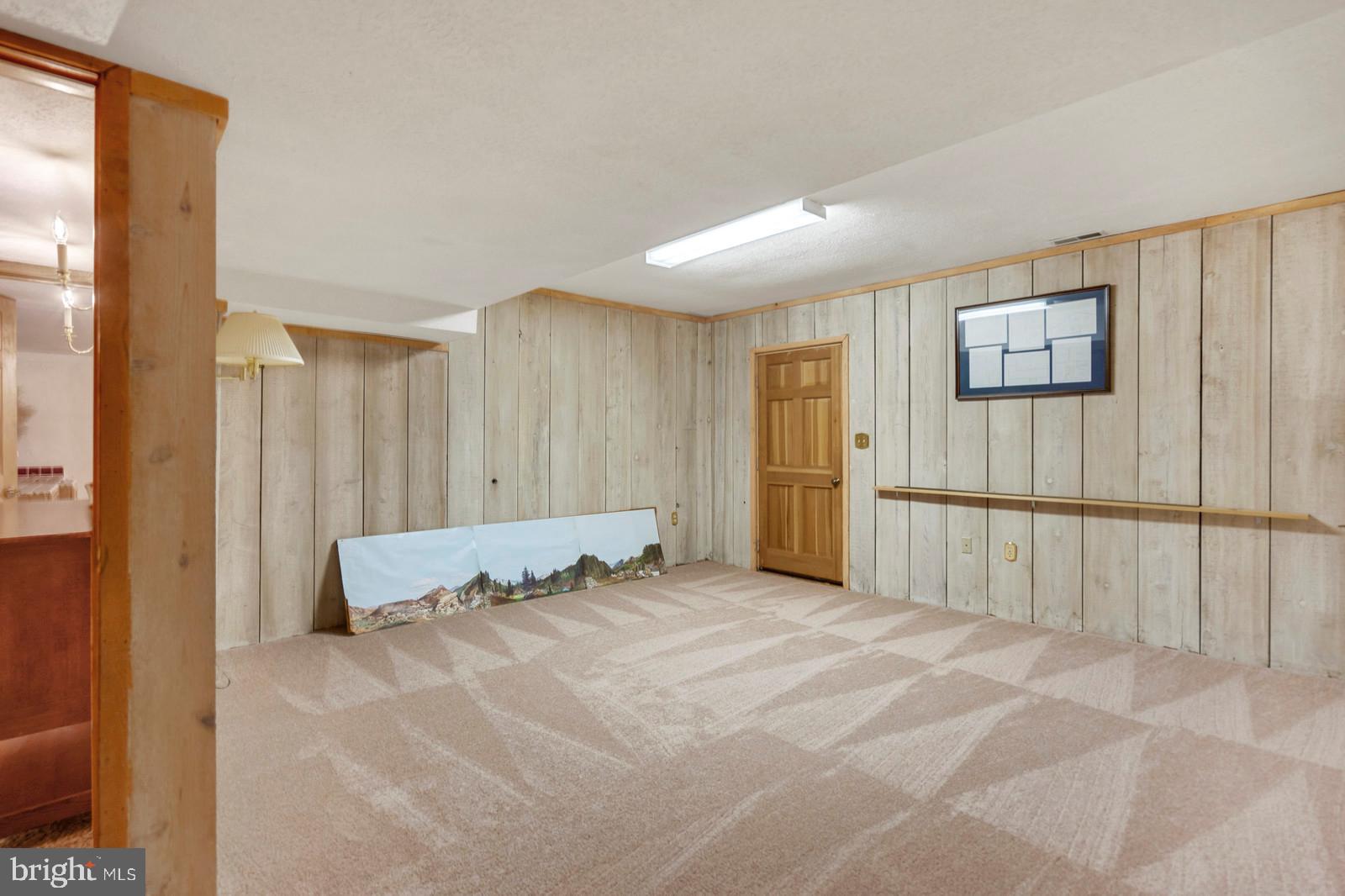 14249 Hume Road Hume, VA 22639 - Photo 30 of 48 a view of a livingroom with a projector
