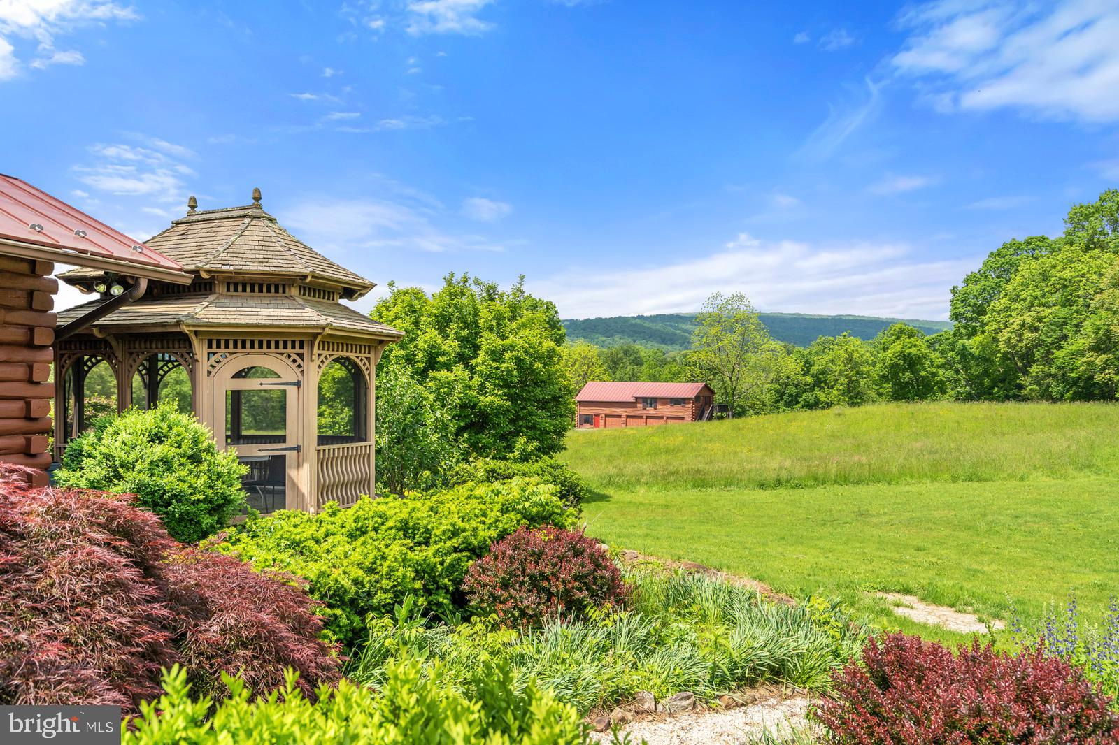 14249 Hume Road Hume, VA 22639 - Photo 38 of 48 a front view of a house with garden