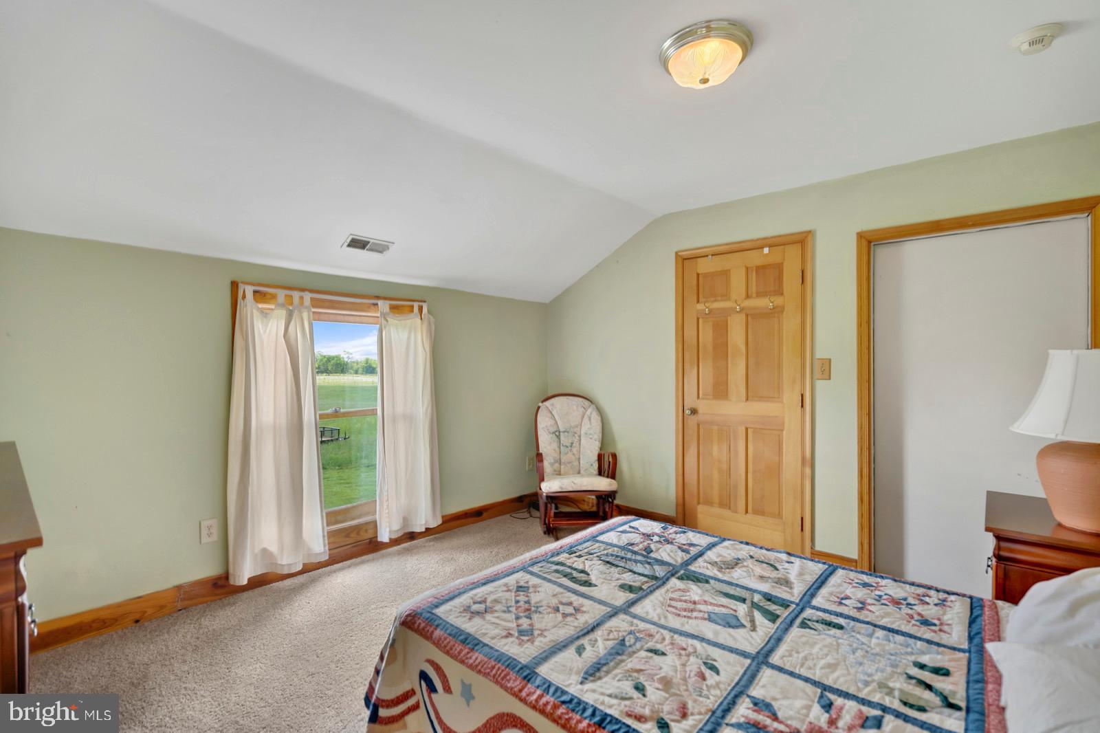 14249 Hume Road Hume, VA 22639 - Photo 43 of 48 a bedroom with a bed and a window