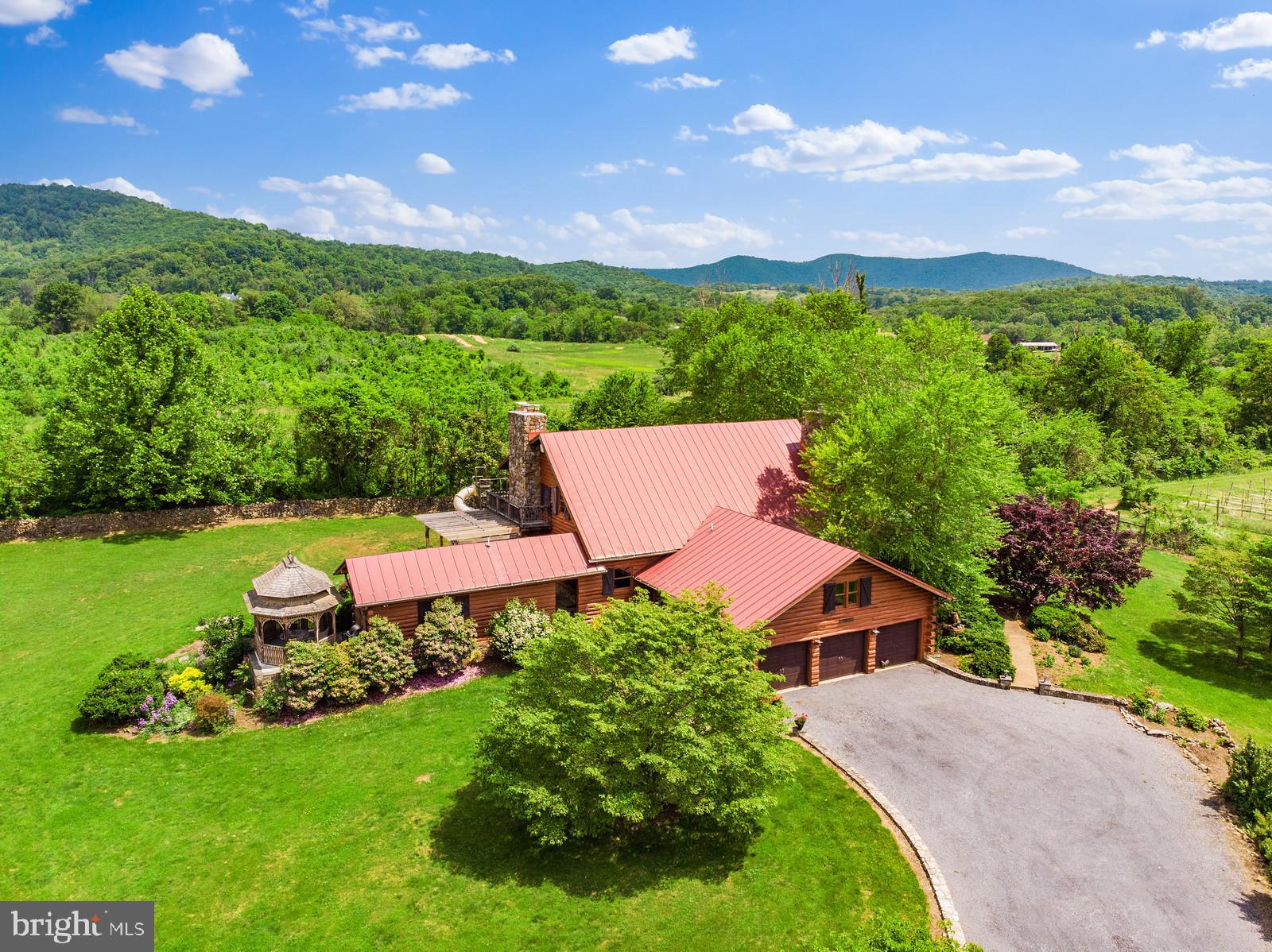 14249 Hume Road Hume, VA 22639 - Photo 6 of 48 a view of a garden with a house