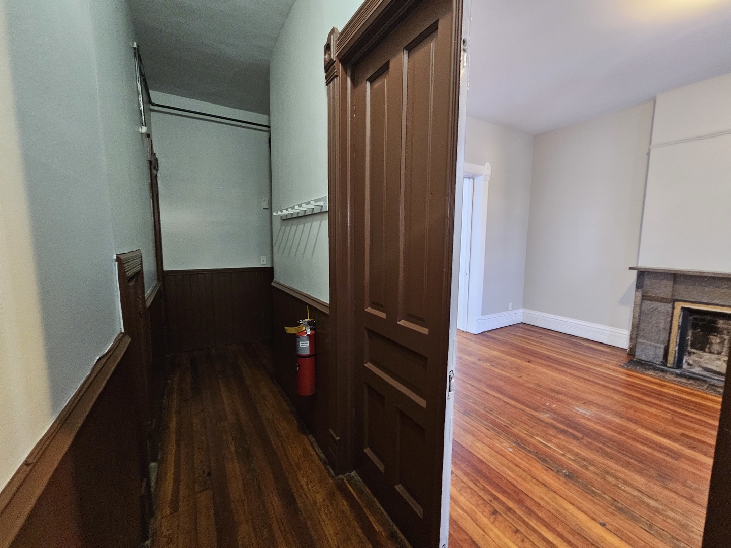 2000 South Ashland Avenue, Unit 1 Chicago, IL 60608 - Photo 2 of 23 a view of a hallway with wooden floor and staircase