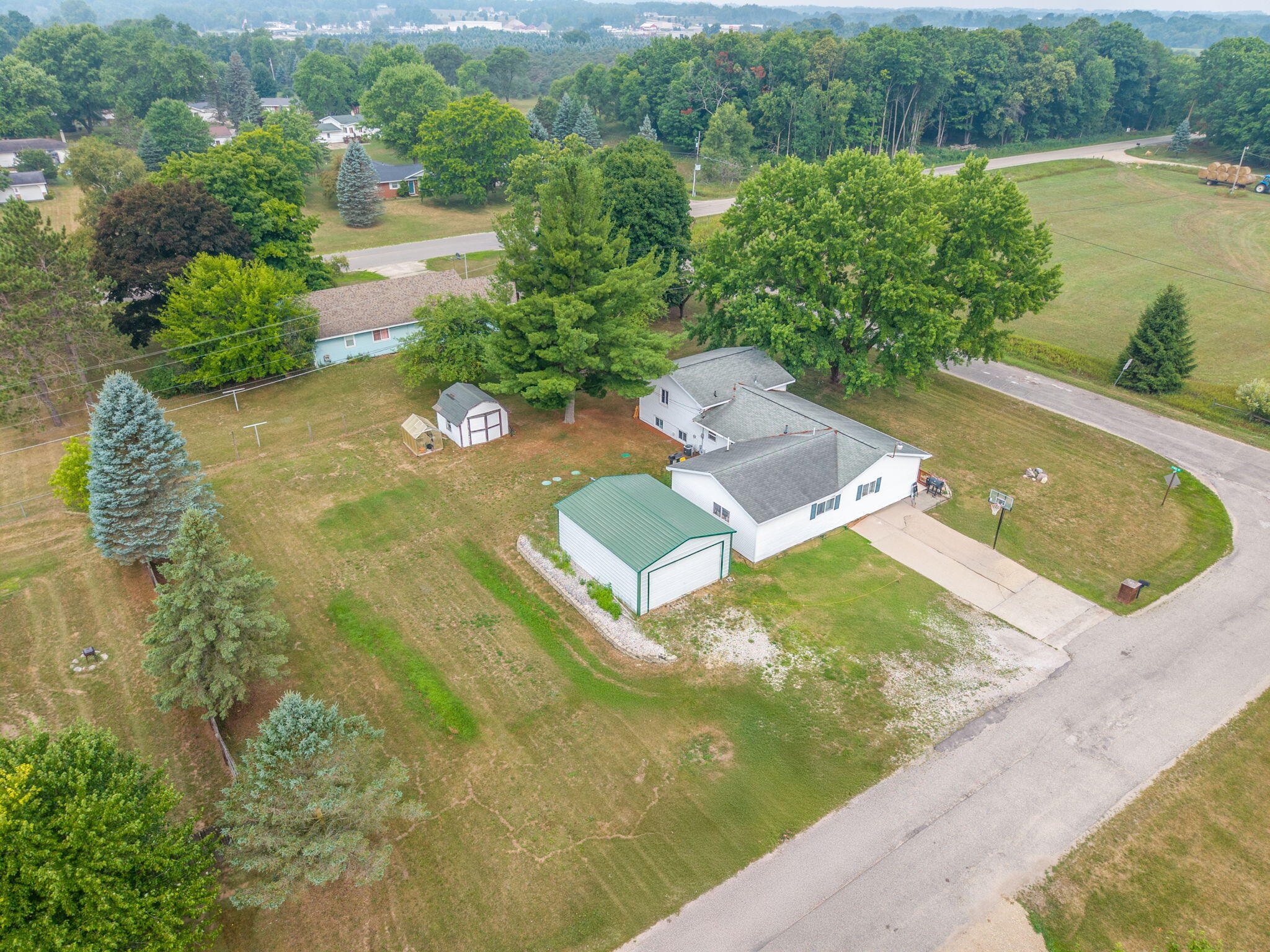 20461 Spruce Road Big Rapids, MI 49307 - Photo 29 of 31 9-web-or-mls-DJI_20250730223438_0427_D-E