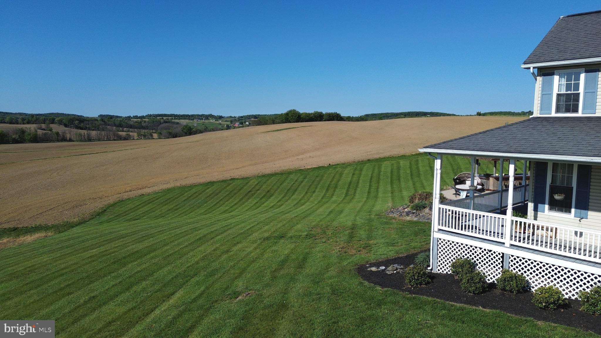 2140 Marston Road New Windsor, MD 21776 - Photo 4 of 48 a view of a house with a yard and a porch