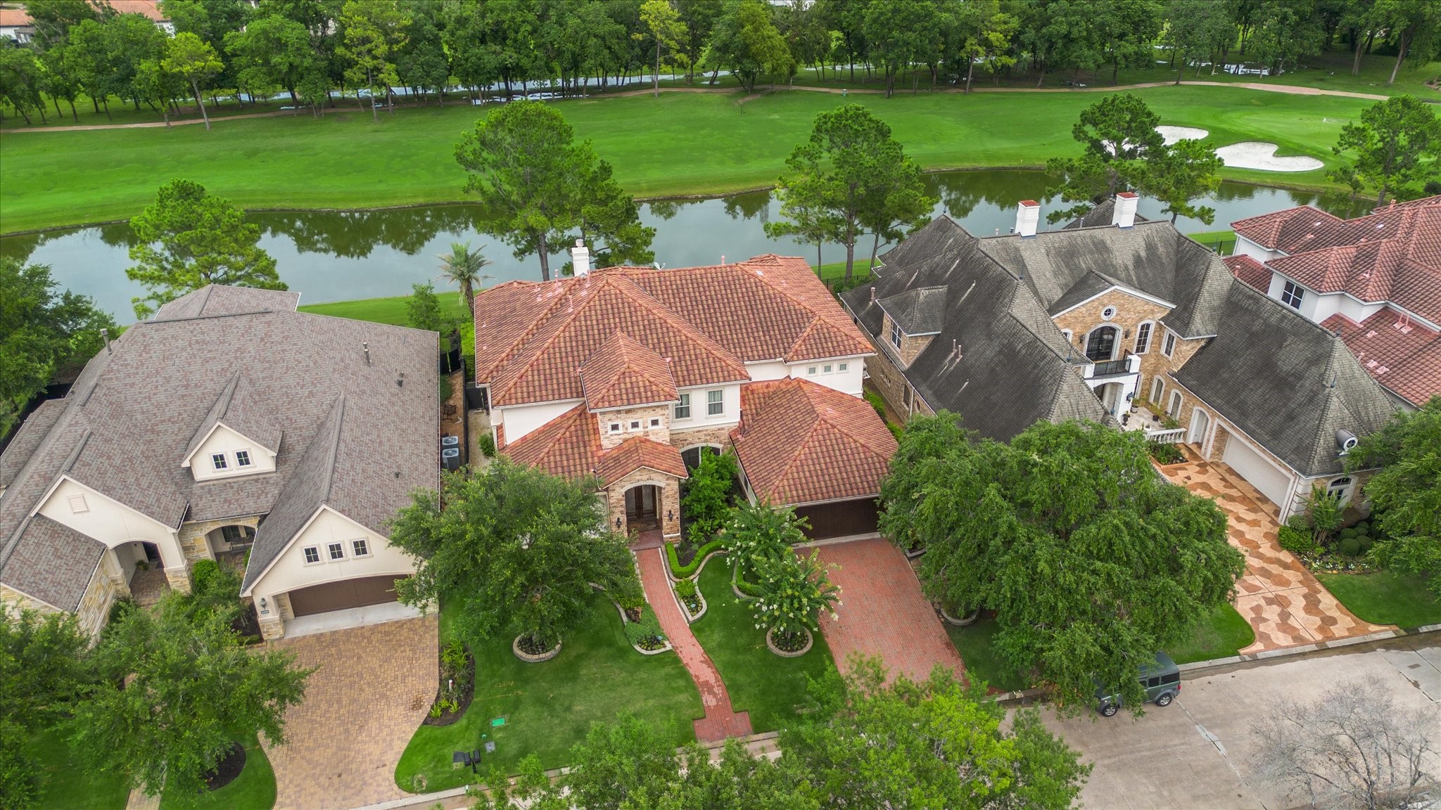 3319 Bridgeberry Lane Houston, TX 77082 - Photo 1 of 50 Birds eye view of 3319 Bridgeberry overlooking the fairway of Hole #4 and fabulous lake view!