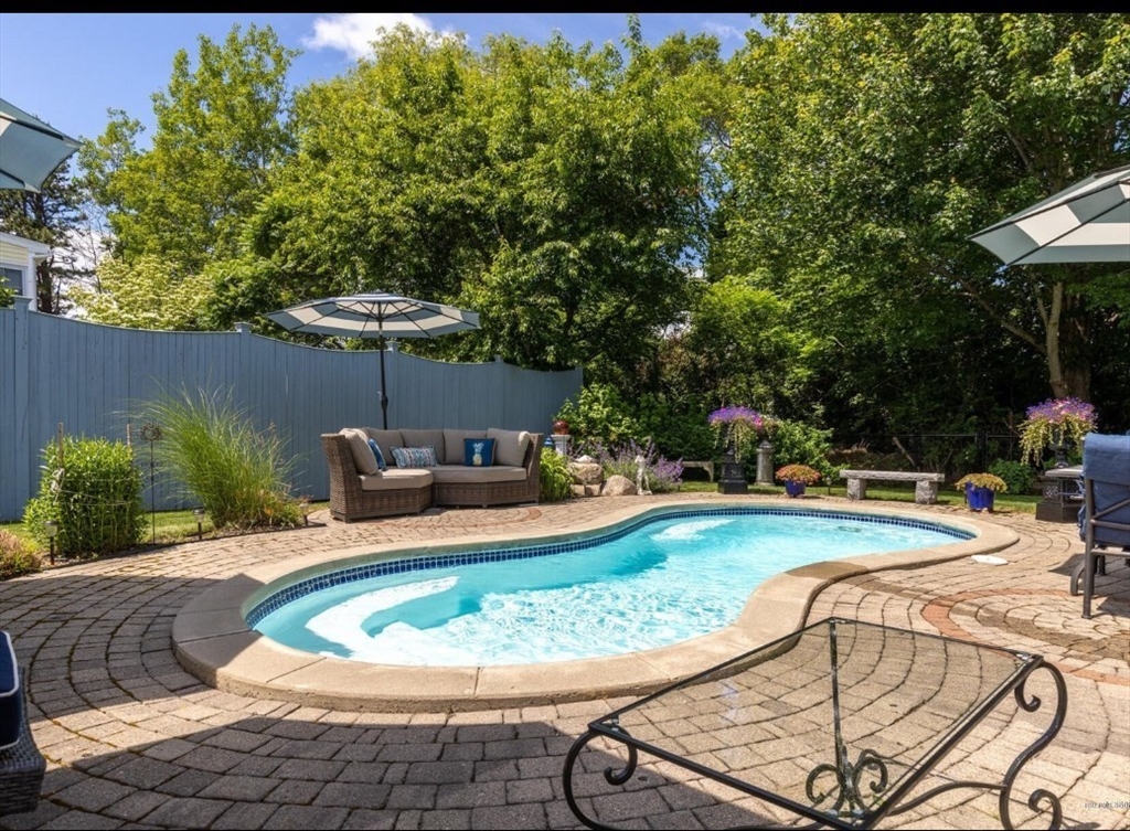 16 Howard Avenue Wells, ME 04090 - Photo 12 of 35 a view of a swimming pool with a patio