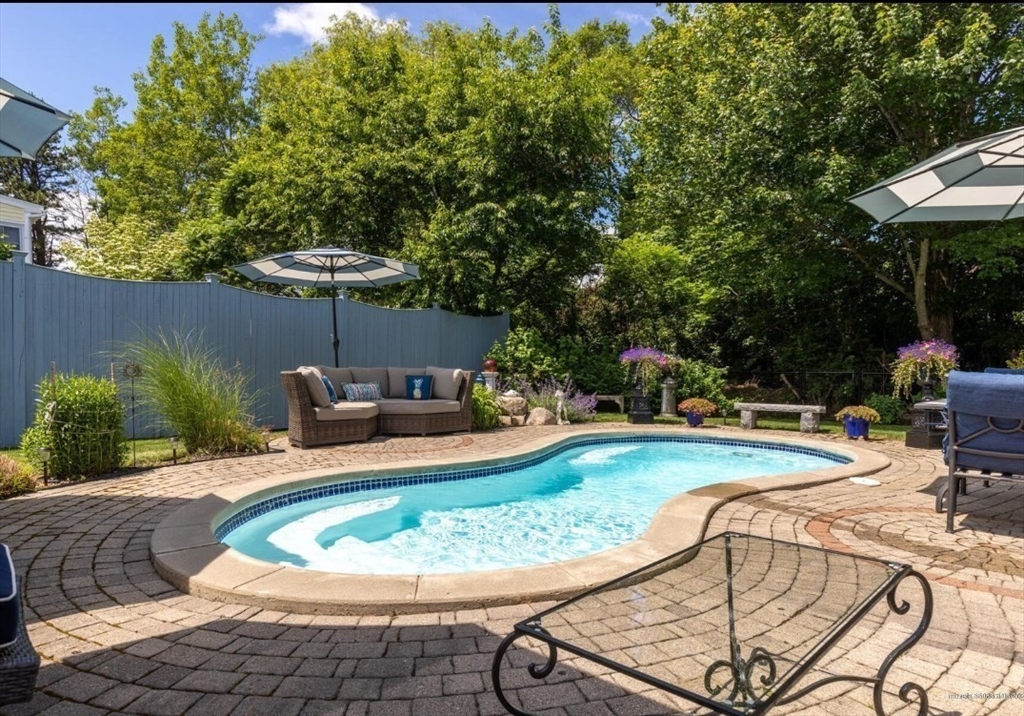 16 Howard Avenue Wells, ME 04090 - Photo 28 of 35 a view of a swimming pool with a patio