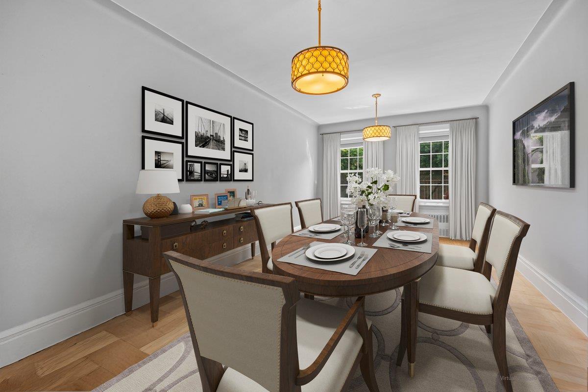 525 West 238th Street, Unit 1L Bronx, NY 10463 - Photo 6 of 20 a view of a dining room with furniture and wooden floor