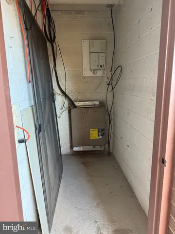 a view of an empty room with stairs