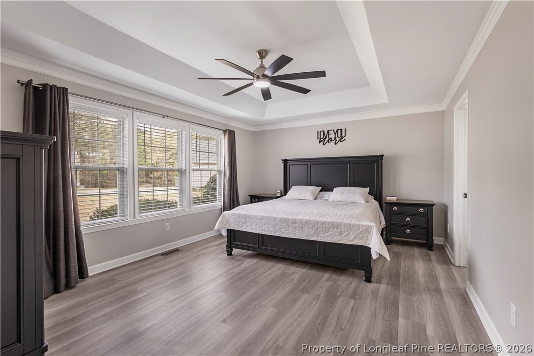 253 Farmstead Court Rockingham, NC 28379 - Photo 9 of 25 a bedroom with a bed and a window
