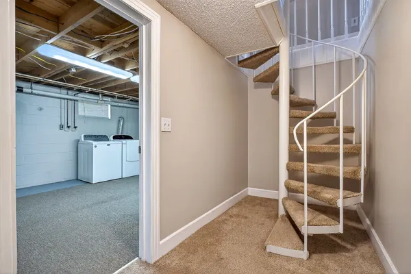 a view of an empty room with empty shelves