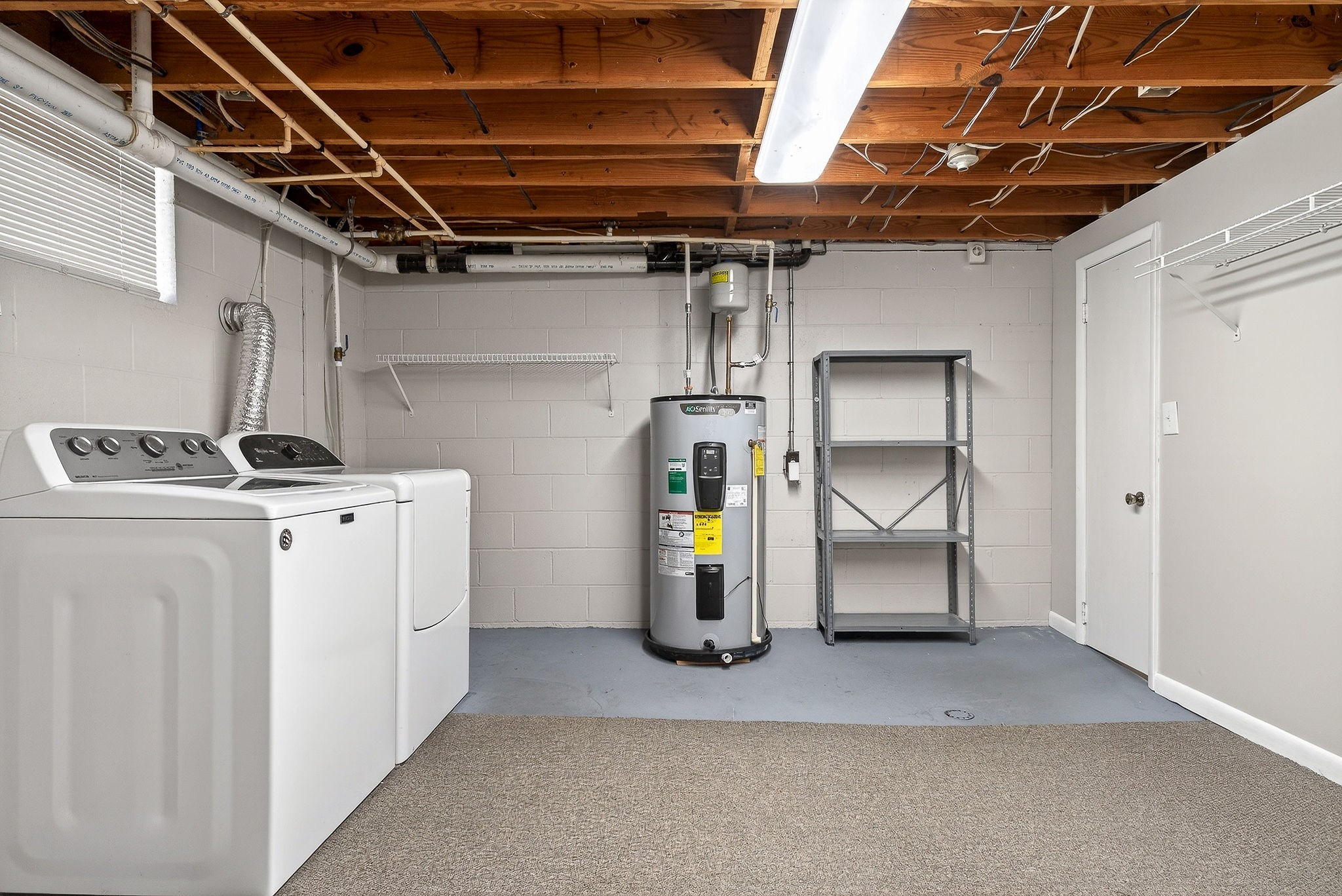 1003 Hodges Ferry Road Sparta, TN 38583 - Photo 24 of 49 a view of storage and utility room with refrigerator and washer