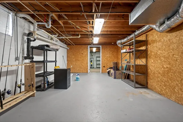 a view of a room with wooden walls