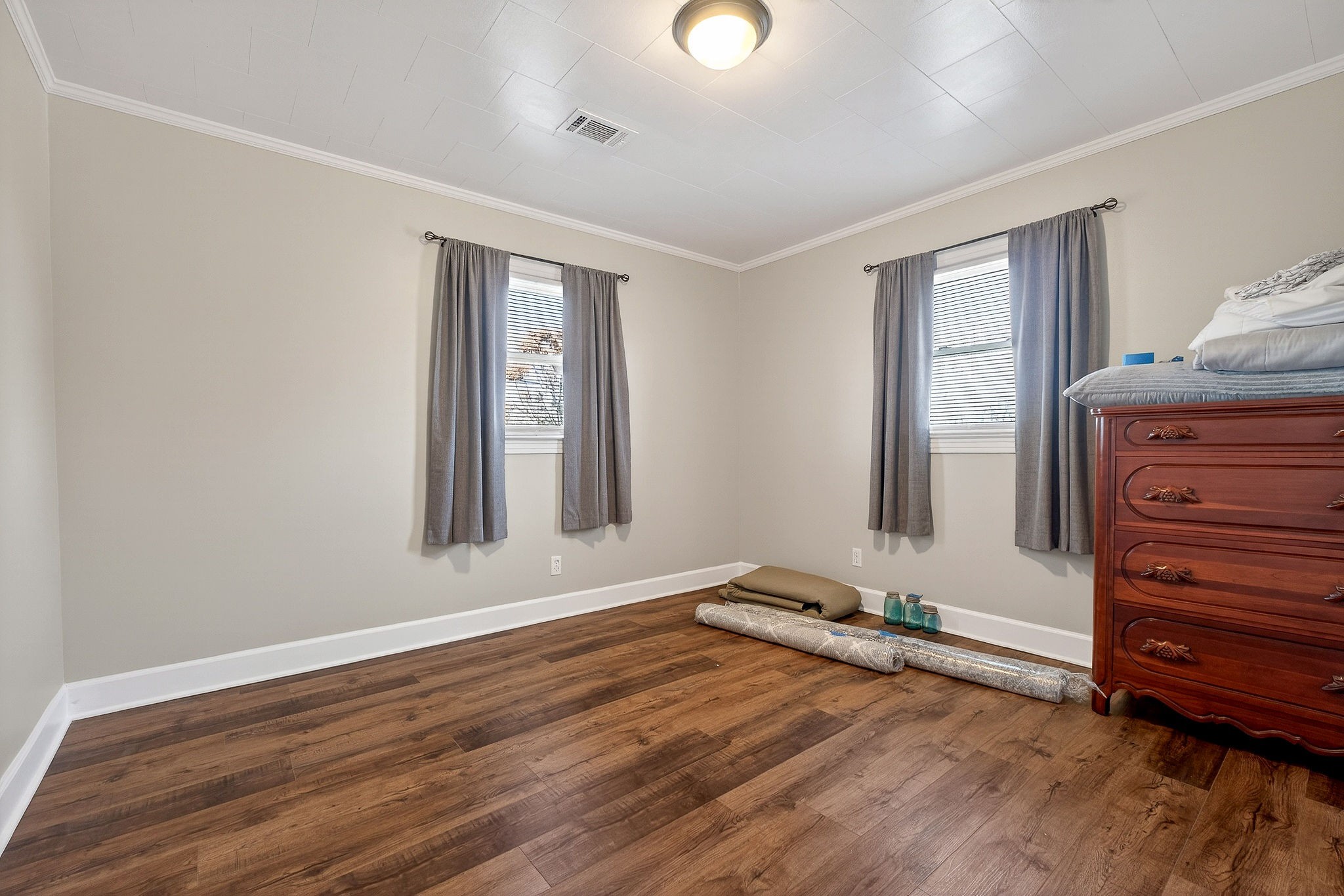 1003 Hodges Ferry Road Sparta, TN 38583 - Photo 36 of 49 a view of an empty room with wooden floor and a window