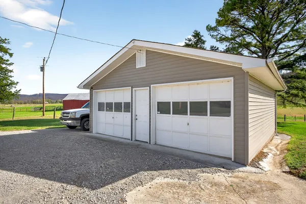 a view of a house with a sink and a yard