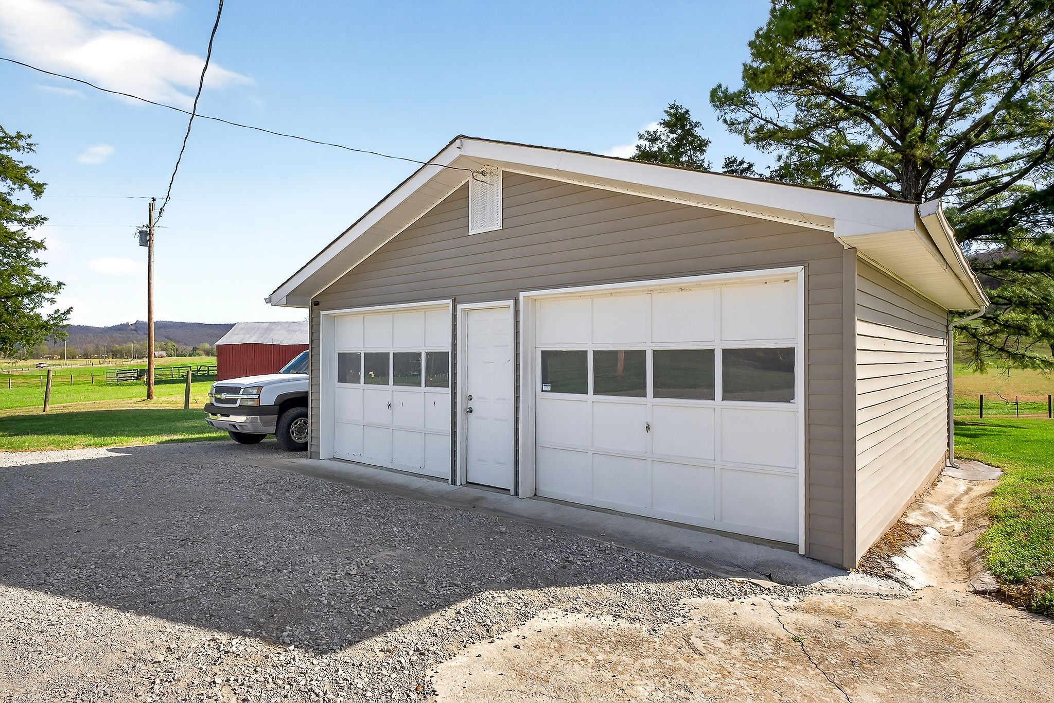 1003 Hodges Ferry Road Sparta, TN 38583 - Photo 44 of 49 a view of a house with a sink and a yard