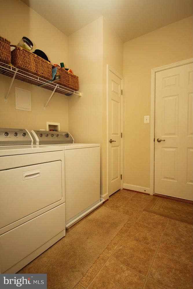 2 Sumantown Road Middletown, MD 21769 - Photo 21 of 30 a view of a storage & utility room with closet dryer and washer
