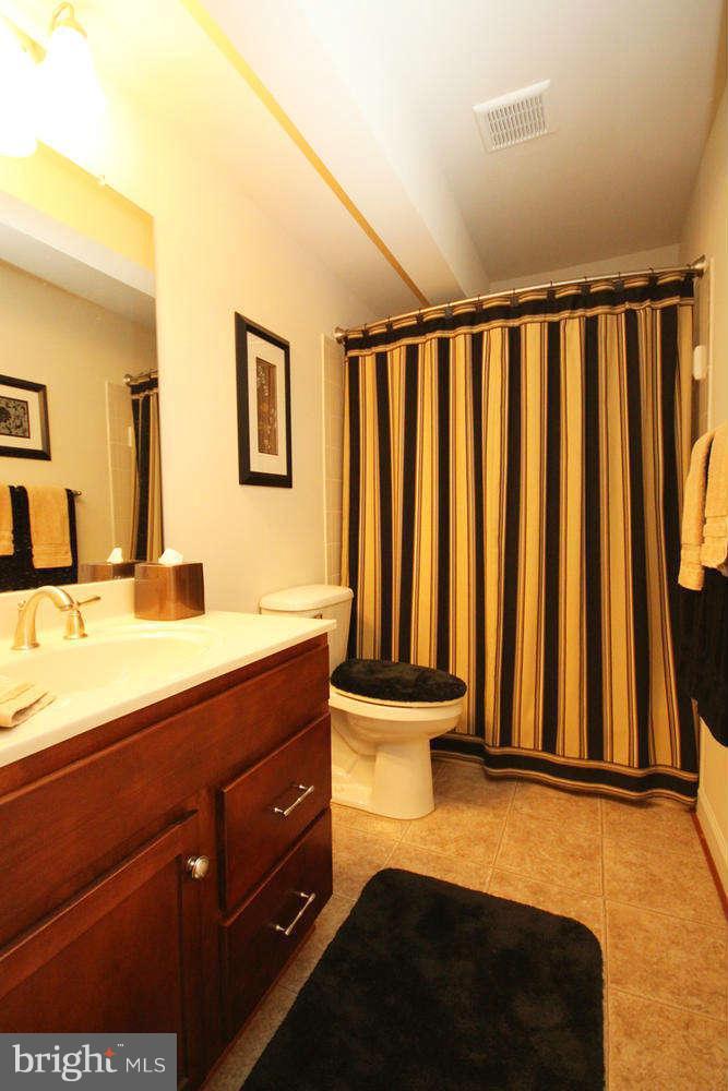 2 Sumantown Road Middletown, MD 21769 - Photo 25 of 30 a bathroom with a sink and a mirror