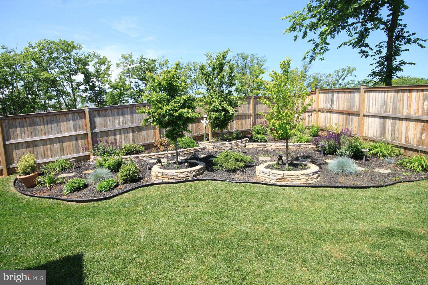 2 Sumantown Road Middletown, MD 21769 - Photo 30 of 30 a view of a backyard with a garden and patio