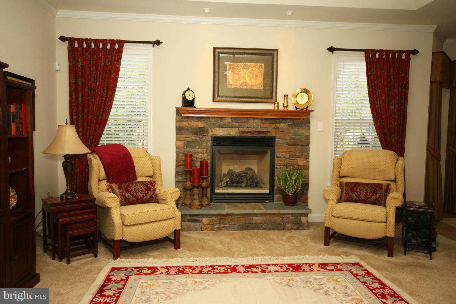 2 Sumantown Road Middletown, MD 21769 - Photo 7 of 30 a living room with furniture and a fireplace