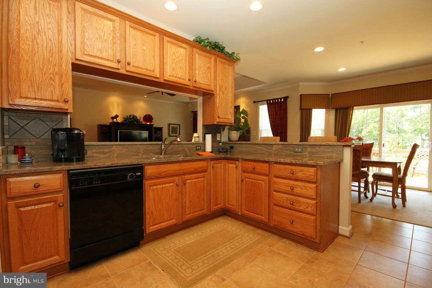 2 Sumantown Road Middletown, MD 21769 - Photo 9 of 30 a kitchen with stainless steel appliances granite countertop a sink and cabinets