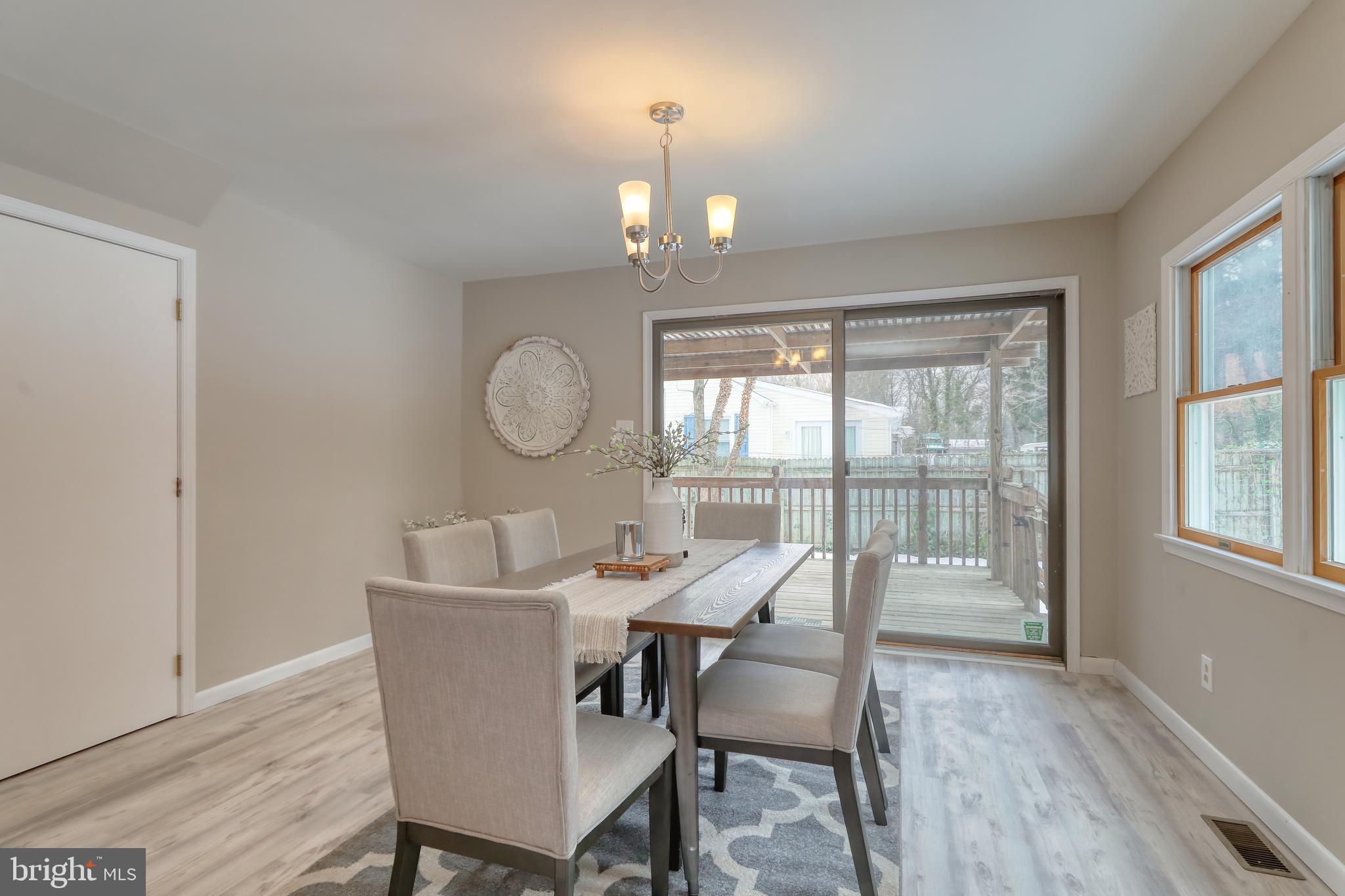 156 Edison Road Cherry Hill, NJ 08034 - Photo 13 of 33 Dining area with sliders to deck and yard