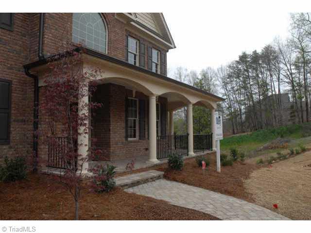 6309 Nesting Way Oak Ridge, NC 27310 - Photo 2 of 8 Other. Wonderful rocking chair front porch